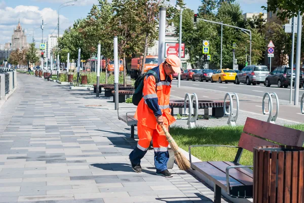 municipal-worker-in-orange-uniform-collecting-garb-2025-03-16-06-59-04-utc-689f2df2e3d4f
